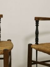 Paire de fauteuils en chêne massif et paille accoudoirs bico