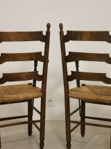 Paire de fauteuils en chêne massif et paille accoudoirs bico