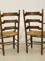 Paire de fauteuils en chêne massif et paille accoudoirs bico