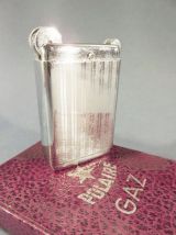 BRIQUET A GAZ POLAIRE DANS SA BOITE