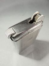 BRIQUET A GAZ POLAIRE DANS SA BOITE