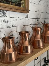 Ensemble de 4 pichets en cuivre 