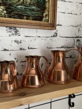 Ensemble de 4 pichets en cuivre 