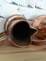 Ensemble de 4 pichets en cuivre 