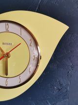 Horloge formica vintage pendule silencieuse Bayard jaune