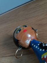  Poupée en bois tourné