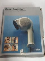 Vintage 70' fer à cheveux Braun protector dans sa boite