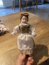 Lot de 44 poupées en porcelaine 