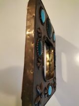 miroir en  pierre et métal
