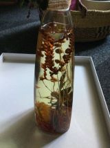 Vintage grande bouteille d.huile de bain fleurs sèches 