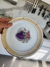 12 assiettes  décor galant porcelaine Limoges