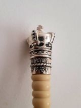 Set couverts de service aux couronnes 