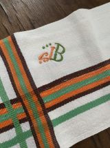 Serviettes de table vintage en orange et vert.