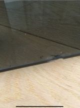 Table basse chrome et verre fumé