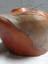 Petit buste drapé en terre cuite patinée