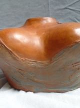 Petit buste drapé en terre cuite patinée