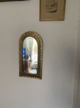 Miroir ethnique en laiton travaillé des annees 80.