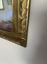 Miroir ethnique en laiton travaillé des annees 80.