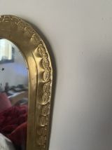 Miroir ethnique en laiton travaillé des annees 80.