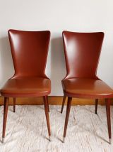 Paire de chaises Skaï vintage pieds compas 