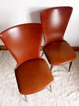 Paire de chaises Skaï vintage pieds compas 