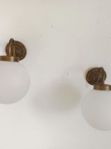 Paire d'appliques col de cygne doré 