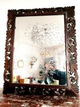 Miroir néogothique en chêne sculpté vers 1940