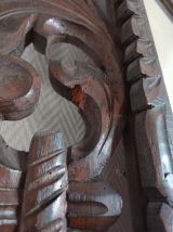 Miroir néogothique en chêne sculpté vers 1940