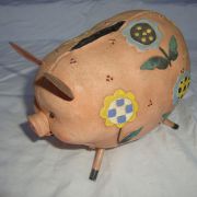 Tirelire cochon et fleurs
