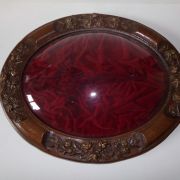 Médaillon en bois sculpté 