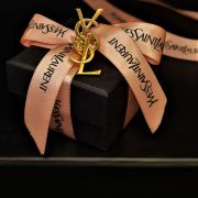 Broche monogramme YSL