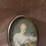 Petit cadre médaillon doré 