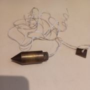 Fil à plomb ancien en laiton