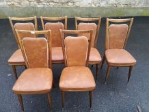  superbe chaise vintage en skaï marron liseré blanc