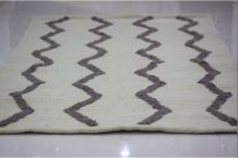 Tapis  fait main en laine couleur beige