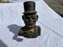 Tirelire mécanique fonte