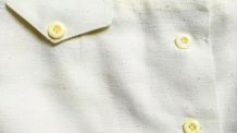 Célestine - Jupe blanche boutonnée vintage longueur genou