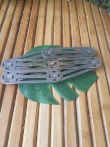 dessous de plat en métal accordéon
