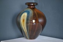 Vase boule en céramique vernis signé