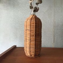 Bouteille/ vase en rotin 