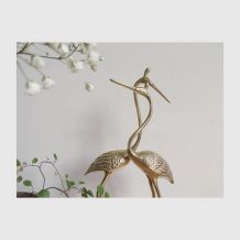 Couple de grues en laiton 