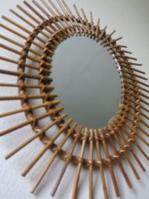 Superbe miroir soleil oval d'époque en rotin 60s