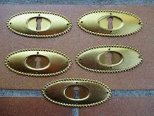 Entree de serrure ancienne ovale dorée pour meuble