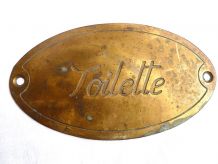 plaque  en laiton  ancienne  toilette