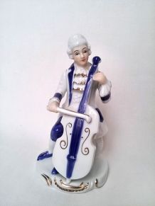 statuette figurine de porcelaine musicien