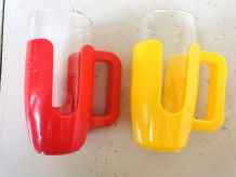 Deux porte verres et leurs verres marque Esso 