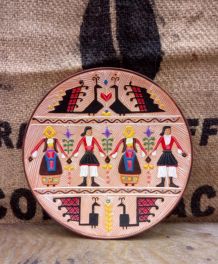 Jolie assiette décorative en terre cuite 