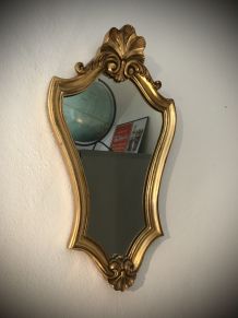 Miroir patiné doré 