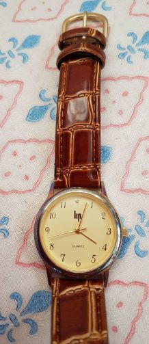 Montre Lip en cuir comme neuve