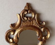Miroir style baroque en bois doré